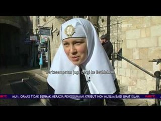 Santa di Yerusalem Sapa Warga dengan Tunggangi Unta dan Bagikan Hadiah - NET24