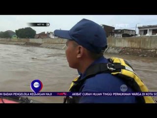 Bocah Hanyut, Petugas Telusuri Aliran Sungai Ciliwung - NET10