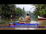 Warga Pati Gunakan Jasa Ojeg Perahu Seberangi Banjir - NET16
