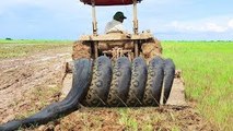 Terrifying!! Brave Brothers Catch Very Big Snakes Nearby Tractor While Plowing The Fields