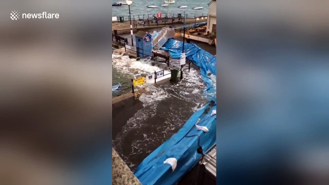 Storm Brian puts new flood defences to work in Fowey, Cornwall