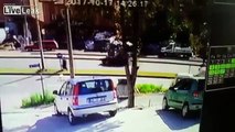 Woman walking across the street gets hit by a car