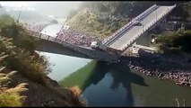 Miraculous escape after bridge collapses breaks in two