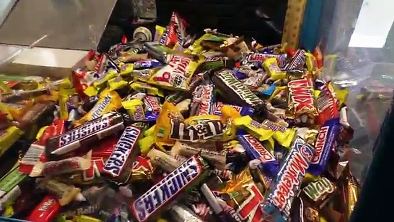 Back at the Chocolate Challenge Candy Pusher Claw Machine!