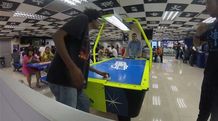 Air Hockey Puck Ricochets Into Guy's Face