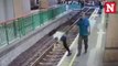 CCTV captures moment man pushes woman onto railway tracks in Hong Kong
