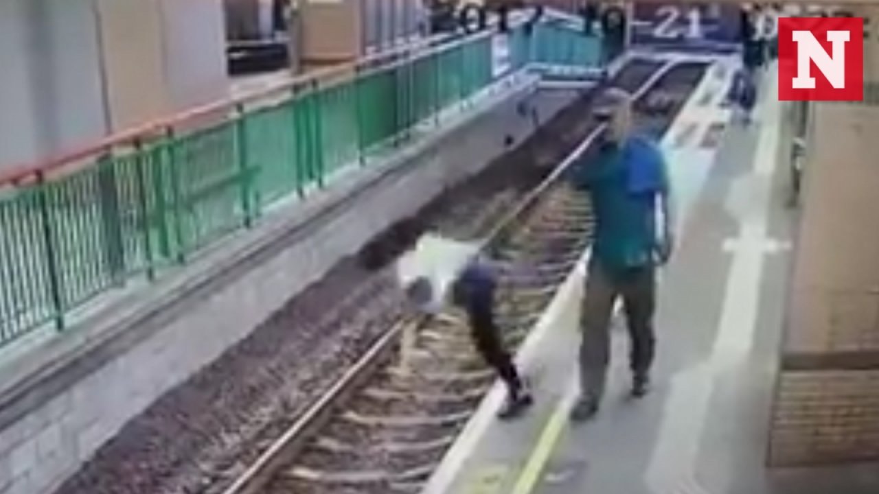 CCTV captures moment man pushes woman onto railway tracks in Hong Kong