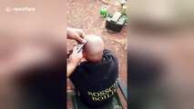 Fisherman gets hook stuck in his head