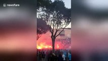 OM fans light up flares in front of Stade Velodrome in Marseille