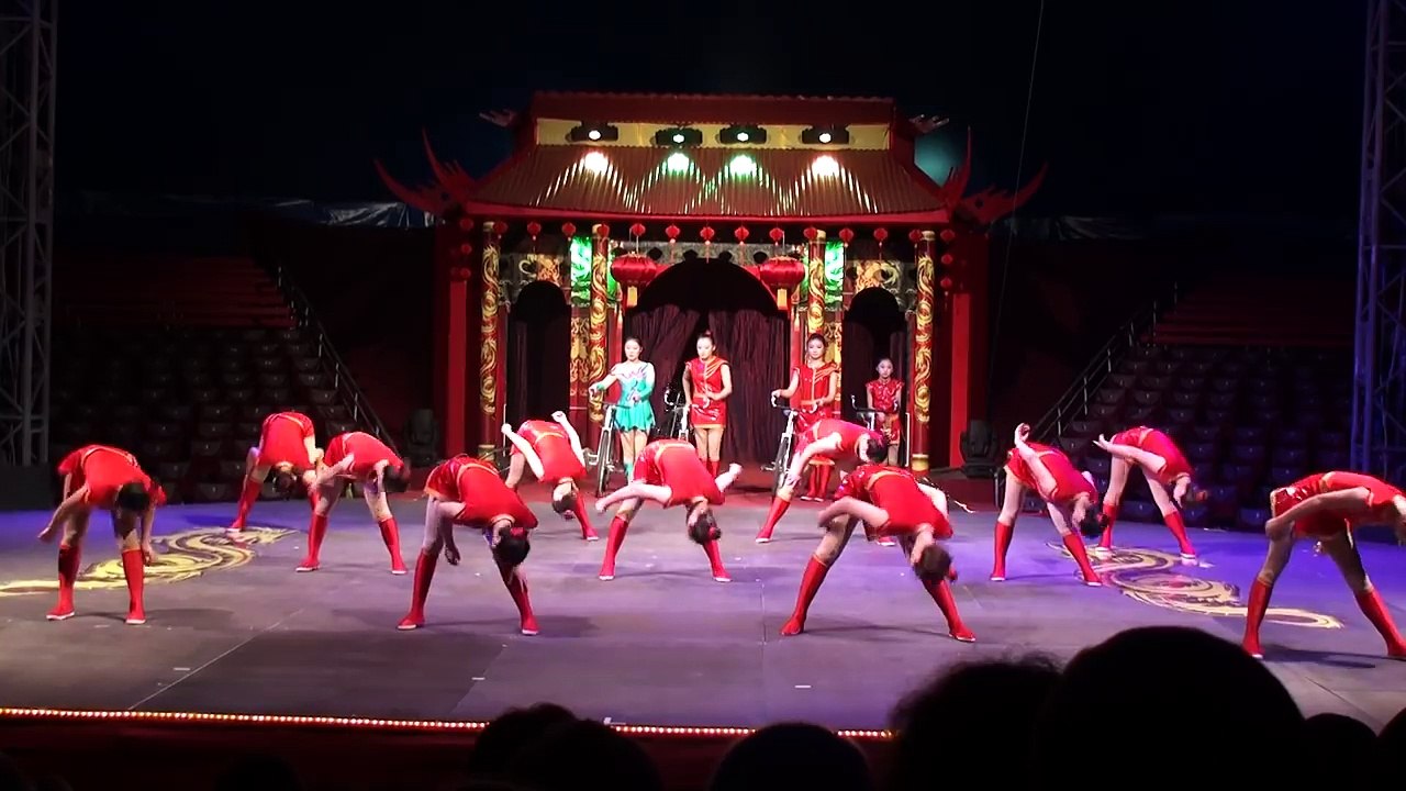 Chinese circus. The show of girl gymnasts on bicycles. Китайский цирк.