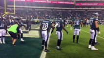 Philadelphia Eagles players dance as they warm up for MNF