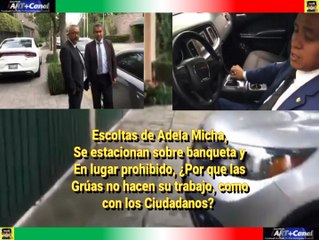 Escoltas de Adela Micha estacionados sobre banqueta y en lugar prohibido
