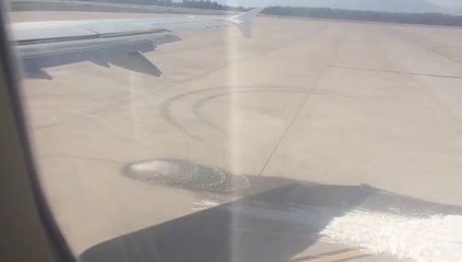 Passengers Watch On In Horror As Their Plane Leaks Fuel Onto The Tarmac