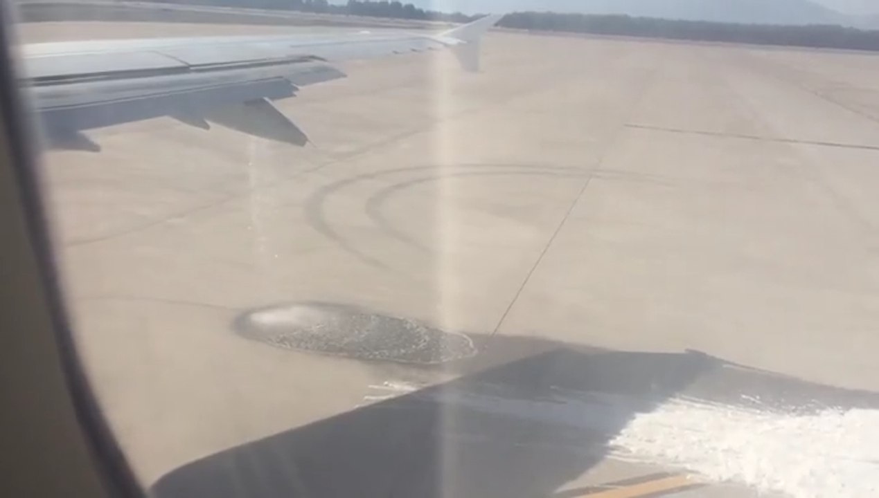 Passengers Watch On In Horror As Their Plane Leaks Fuel Onto The Tarmac