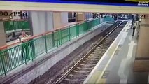 Sickening moment cleaner is shoved onto train tracks by commuter