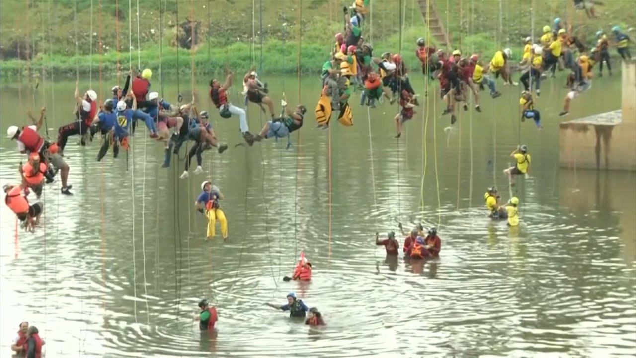 Watch: 245 Thrill-seekers jump off a bridge in Brazil for world record