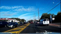 Dog falls out of window of moving truck