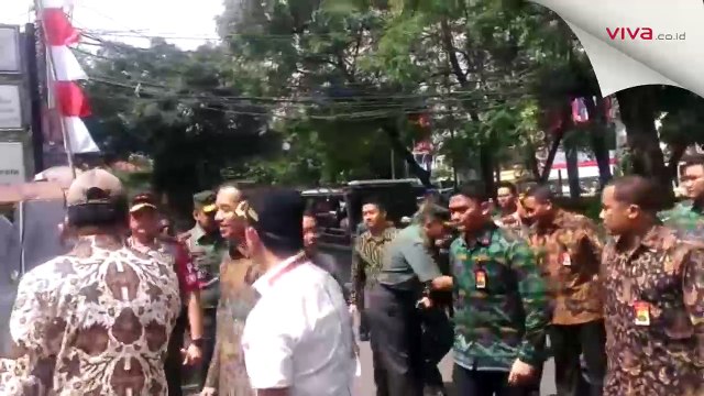 Presiden Jokowi dan Istri Gunakan Hak Suara di TPS 04