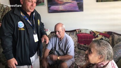 Soldiers sing with woman at Puerto Rican care home