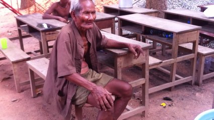 An old man with Stroke disease very sympathize in Siem Reap Cambodia