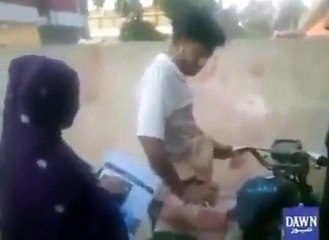 Boy Beatn by A girl on road in Pakistan must see