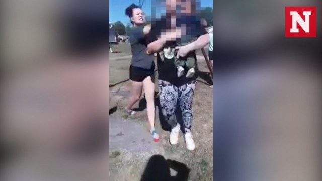 Shocking video shows mother being assaulted while holding six-month-old baby