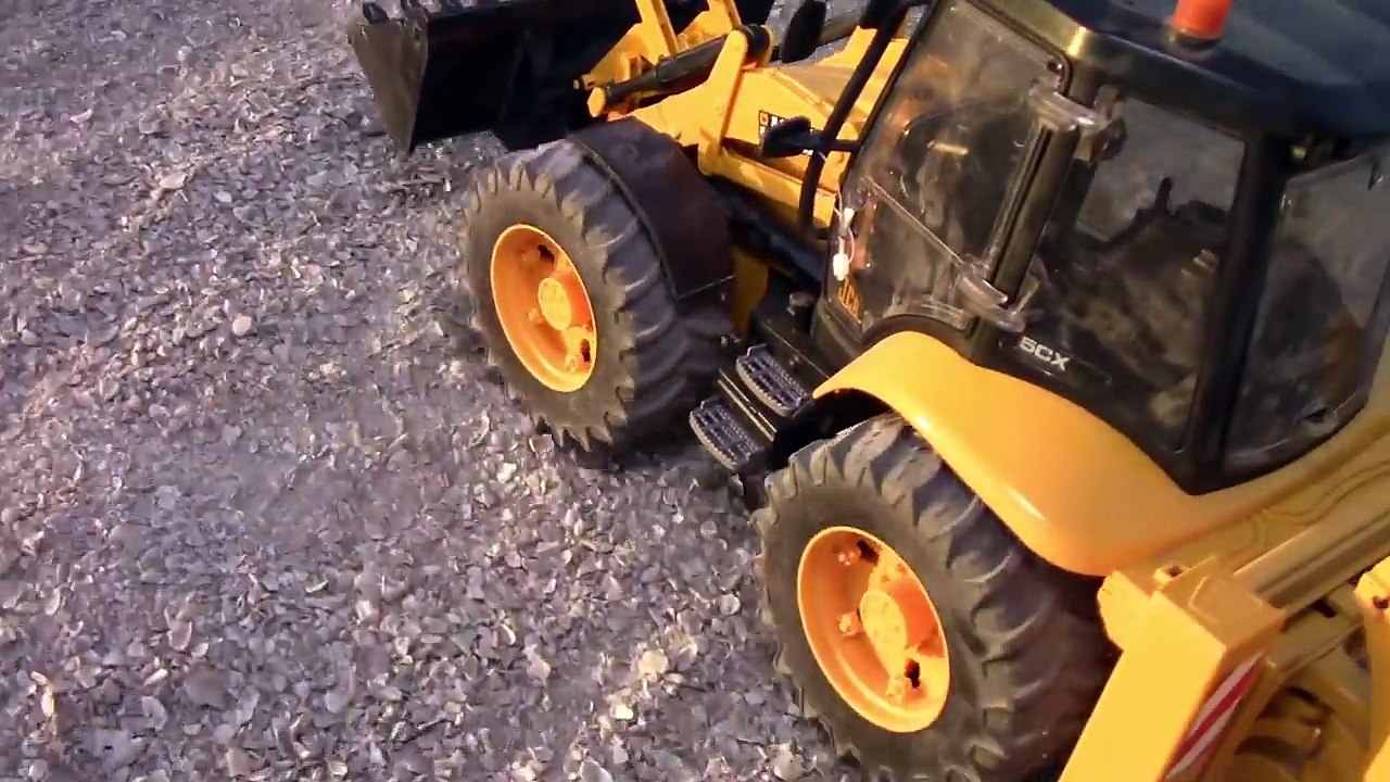 Construction Trucks for Kids: Toy Backhoes and Bulldozers at Dirt BMX Bike Park - Riding on Roller