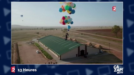 Il vole... uniquement porté par des ballons !