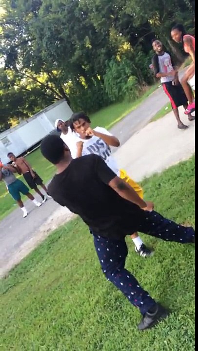 Hood fight two black guys fighting because a cigarette dispute