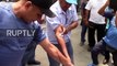 Peru: Striking workers puncture veins and drip blood over payroll demands