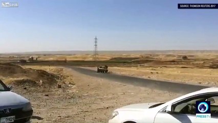 Скачать видео: Pehmarga militants fire rockets at Iraqi army forces