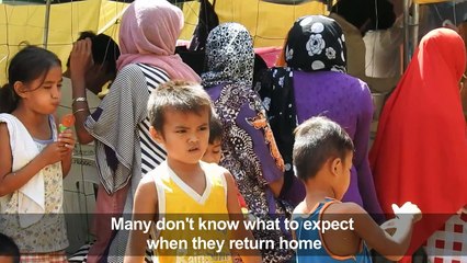 Long way home for war-torn Philippine city's residents