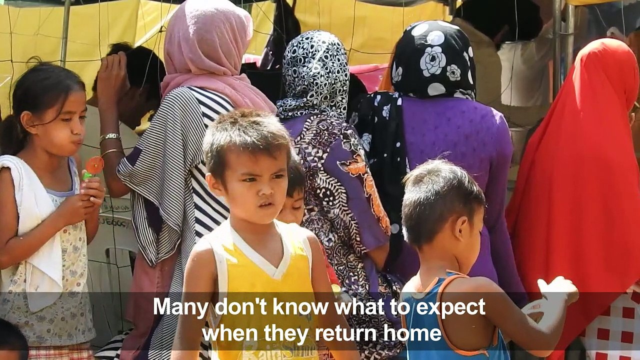 Long way home for war-torn Philippine city's residents