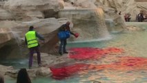 Rome's Trevi Fountain runs red after man pours dye in water