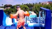 Kid playing at the WaterPark. Family Fun playtime in the Pool. Entertainments for children 2017-SrTzxDvYXRE