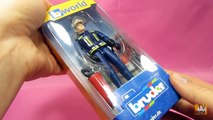 Figurine of a firefighter. Bruder. Unboxing. Overview. Game. cartoon Unboxing. ☺123abc Kids Toy TV-nSooZ3PPOjM