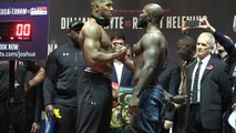 Intense! Joshua & Takam engage in extended handshake at weigh-in