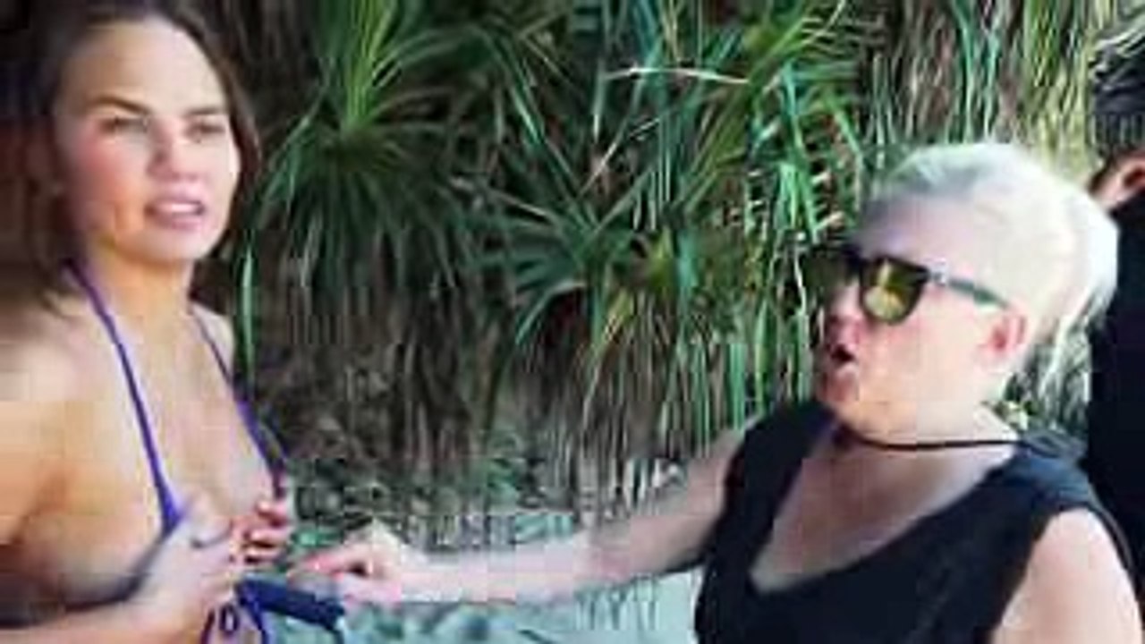 Chrissy Teigen Remembers Her Vajazzle, 'Sand-Suit' & Revealing Looks  Sports Illustrated Swimsuit