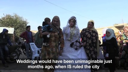 Lipstick, mixed dancing at first Raqa wedding since IS