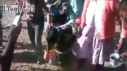 Kid heavily drunk in a peruvian festival