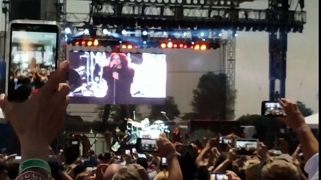 ozzy osbourne performs bark at the moon during a solar eclipse