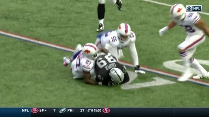 Amari Cooper somehow holds on to this pass with multiple defenders on him