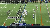 Oakland Raiders wide receiver Amari Cooper somehow holds on to this pass with multiple defenders on him