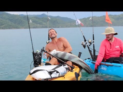 Boaters Struggle to Control Huge Fish After Catch