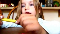 3 year old doing a makeup tutorial using crayons