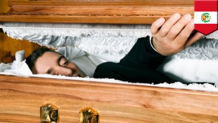 Dead dude found still breathing at own funeral