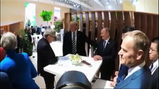 G20 - Russia and the US shake hands-tKaz2lT0_kw