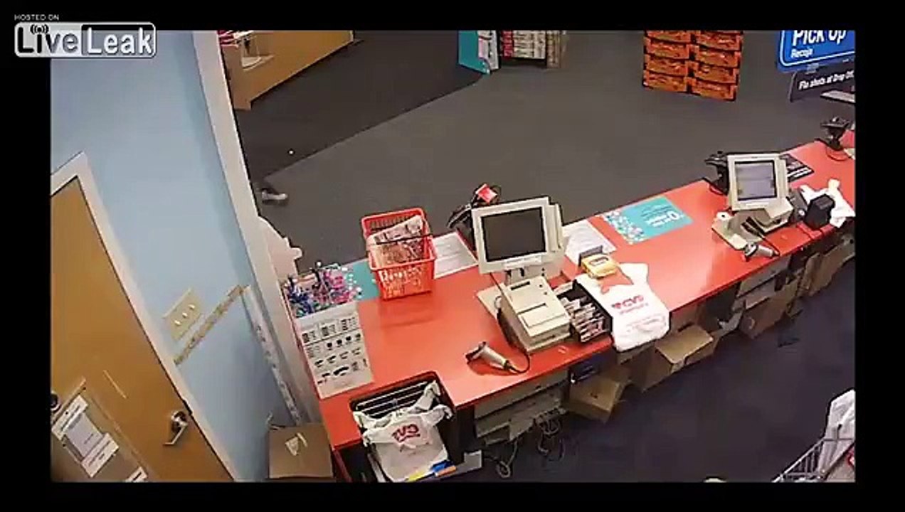 Guy Jumps Pharmacy Counter During Robbery