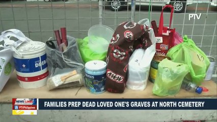 Families prep dead loved one's graves at North Cemetery #Undas2017