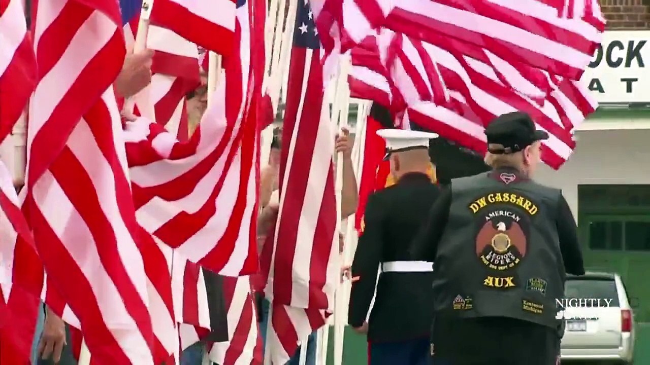 Two proud Marines in their dress uniforms taking one final ride after facing the one battle they couldn't win....